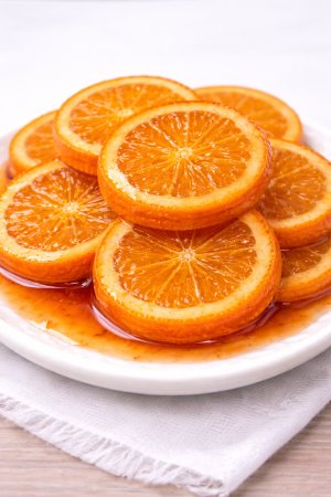 ПОРТОКАЛОВИ РЕЗЕНИ НА ШАЙБА СЪС ЗАХАРЕН СИРОП